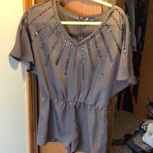 Brown beaded romper.